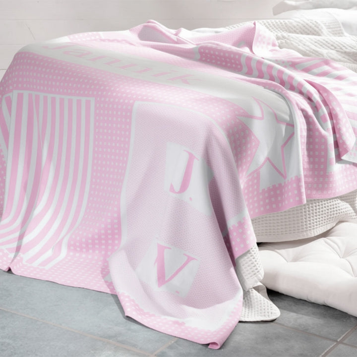 Große rosa Bio-Baumwoll-Kuscheldecke mit Krönchen-Motiv, weich und bequem für Babys und Kinder.